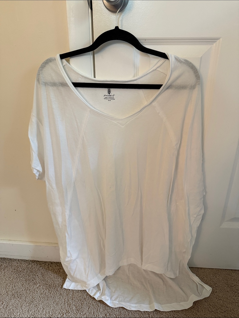 Free people movement White high low v neck NWT size medium